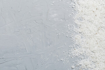 Background from white sea salt. Coarse rock salt texture witth copy space
