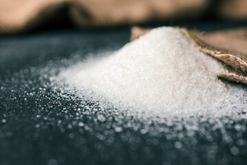 Sugar spills out of the bag