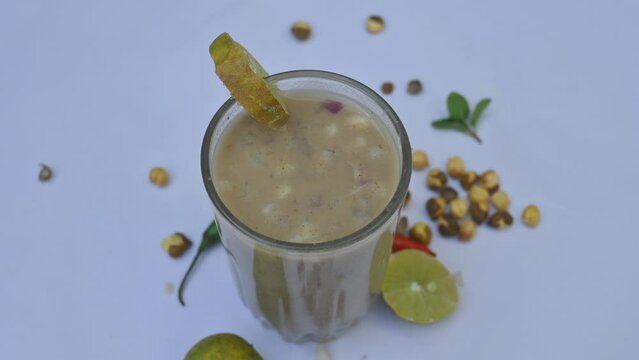 Sattu Sharbat. It is a popular drink in India at summer season. Its mad from sattu powder or roasted Bengal Gram flour. It is prepared by mixing sattu with water, salt, onion, mint, coriander leaves.