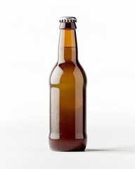 A close-up of a single brown beer bottle on a white background