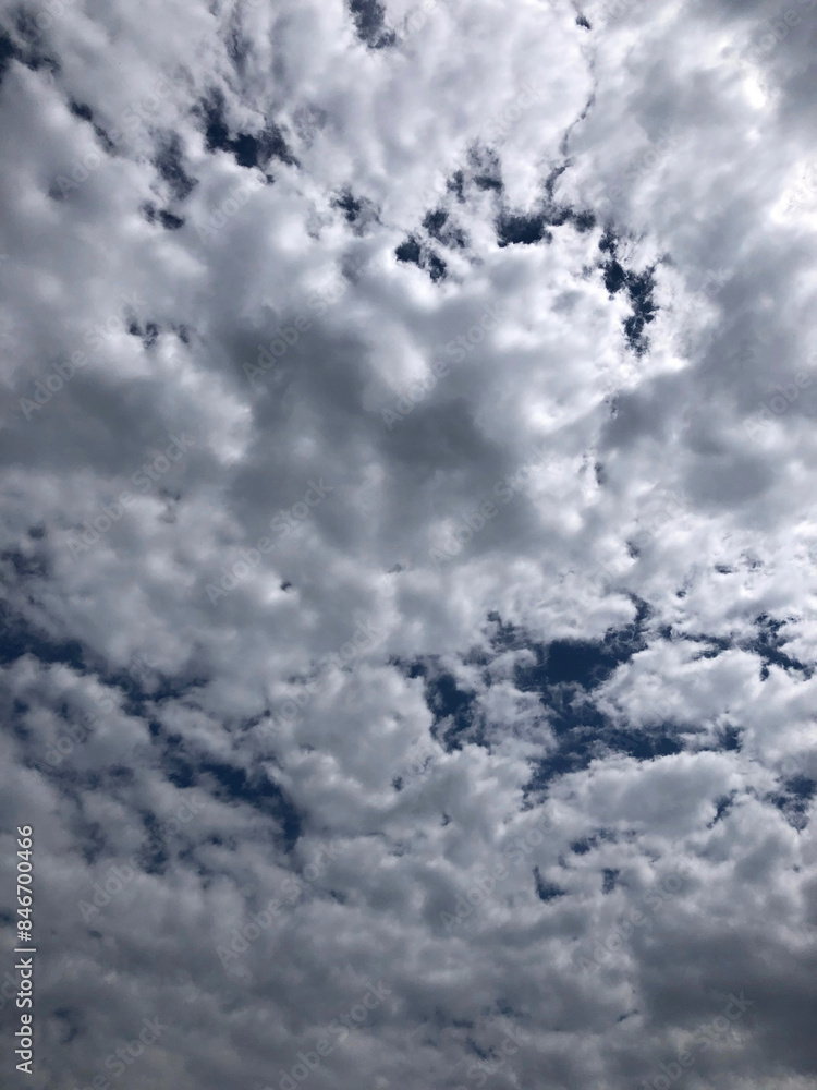 Wall mural silver clouds fill the sky