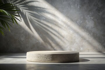 Gray round stone podium with palm leaves, shadows and light for product presentation.
