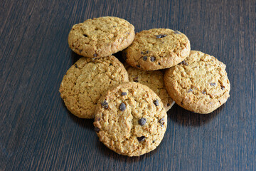 a pile of cookies with chocolate chips top view