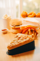 Multiple type of Fast food on table.