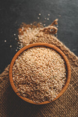 Wooden plate with sea salt and spices