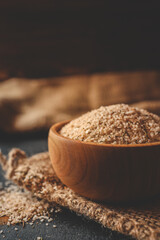 Wooden plate with sea salt and spices