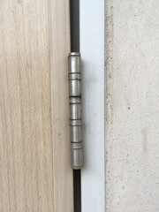 old wooden door handle , door hinge