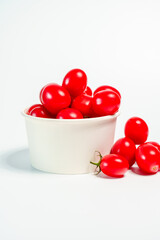 Studio shot photo of cherry tomato against white background