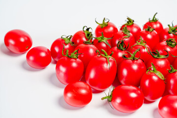 Studio shot photo of cherry tomato against white background