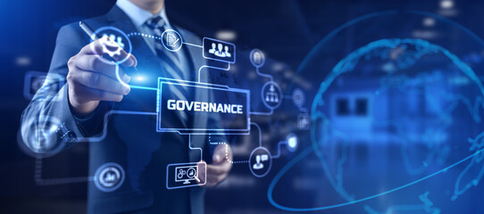 Governance ESG concept. Businessman pressing button on screen.