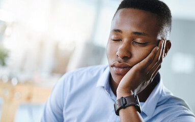 Naklejka premium Nap, relax or tired black man in office overwhelmed by deadlines with fatigue, face or burnout. Lazy worker, depressed consultant or exhausted professional resting or sleeping on hand in business