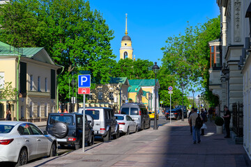 Naklejka premium Bolshaya Nikitskaya Street in center of Moscow in Russia. Cozy cityscape in Moscow. Architecture and landmarks of Moscow.