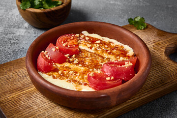Grilled Suluguni in Ceramics with Tomatoes and Nut Sauce – Traditional Georgian Cuisine