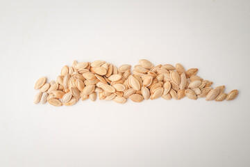 Pumpkin seeds on white background
