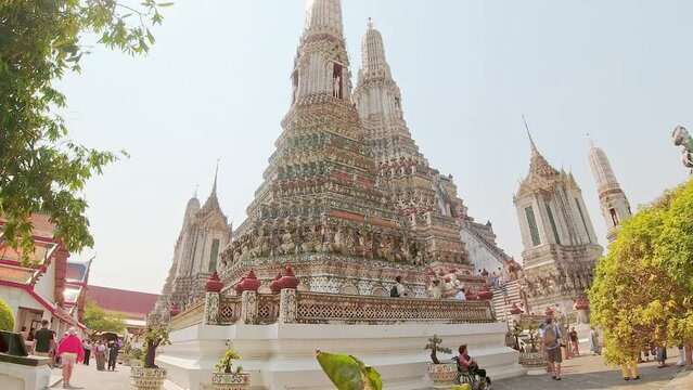 Bangkok, Thailand - 20th march, 2024: time lapse Wat Arun Ratchawararam Ratchawaramahawihan or Wat Arun - Buddhist temple in the Bangkok Yai district of Bangkok, Thailand