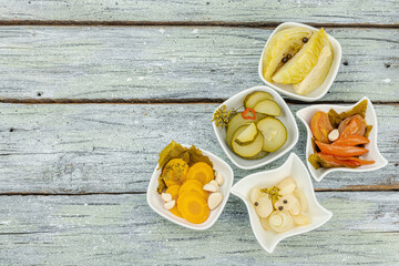 Assorted fermented vegetables. Probiotics, healthy food, vitamins. Vegan lifestyle, pickled dish