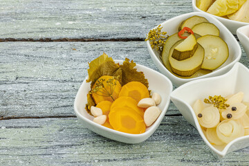 Assorted fermented vegetables. Probiotics, healthy food, vitamins. Vegan lifestyle, pickled dish
