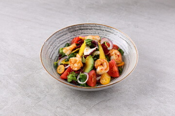 Shrimp, Avocado, Tomato Salad. Grilled View from above, top studio shot