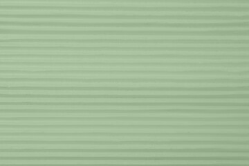 Obraz premium Sage green textured surface as background, closeup