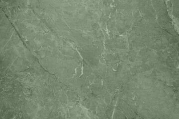 Sage green textured surface as background, closeup