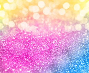 Bright colorful sparkling glitter with bokeh effect, closeup. Background for party invitations or holiday cards