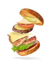 Delicious burger ingredients in air on white background