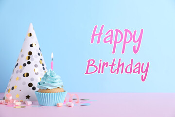 Birthday card with cupcake and party hat on light blue background