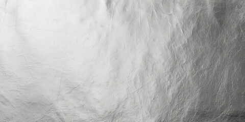A stunning silver textured background with a metallic shine and crumpled foil effect, ideal for elegant and modern designs, luxury products, and stylish presentations..