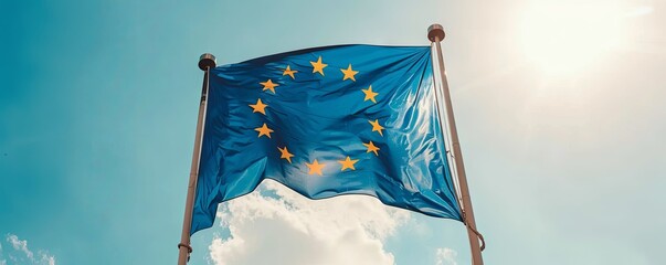 European Union flag waving against a clear, blue sky