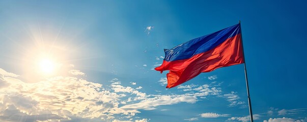 Cambodia flag against a clear, blue sky