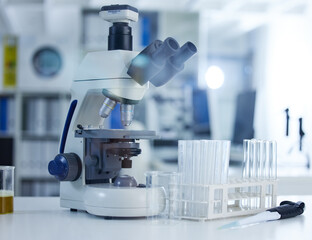 Microscope, desk and science in laboratory for medicine, pharma engineering for FLiRT Covid or new virus. Chemistry, research or development with magnifier for healthcare, innovation or biotechnology