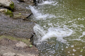 The small waterfall in the creek.