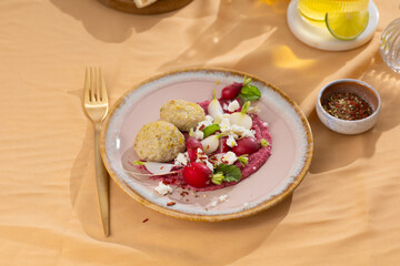 Savor a Mediterranean meal with hummus, falafel, and veggies for a healthy option