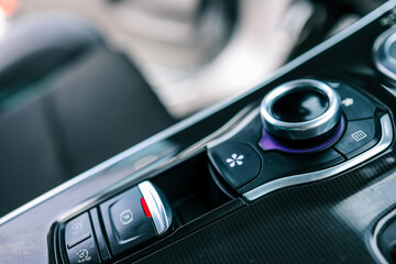 Car multimedia system control joystick. Radio, multimedia, and navigation adjustment buttons