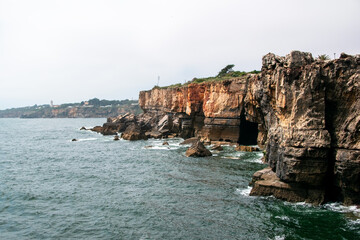 Naklejka premium Rocky coast of the Mediterranean Sea in Algarve, Portugal