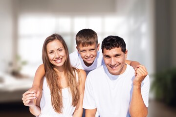Obraz premium Happy young Parents With child have fun at home