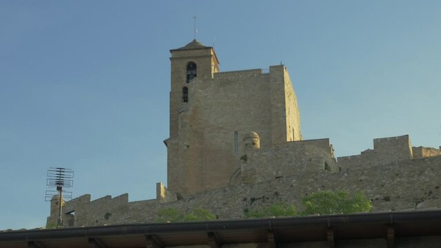 Benabarre's castle, also known as Castillo de los Condes de Ribagorza, on a summer afternoon or sunset or sundown.