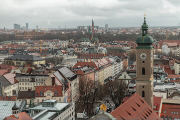 Obraz premium Aerial view of Aerial view of Tower of St. Peter's Church and surrounding buildings. The Church of St. Peter, Downtown view, Copy space, Selective focus.