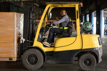 Warehouse workers or forklift driver man with hardhats and reflective jackets in vehicle using walkie talkie radio controlling stock and inventory in retail warehouse logistics, distribution center
