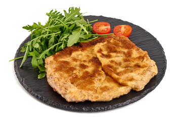 Fried pork schnitzels in breadcrumbs, isolated on white background