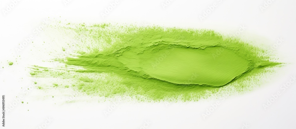 Leinwandbilder vivid green powdered substance seen in tight focus on a plain white background. with copy space imag