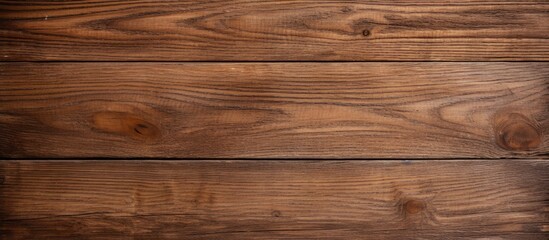 Fototapeta premium Detailed view of a wooden wall with a brown stain applied on the surface. with copy space image. Place for adding text or design