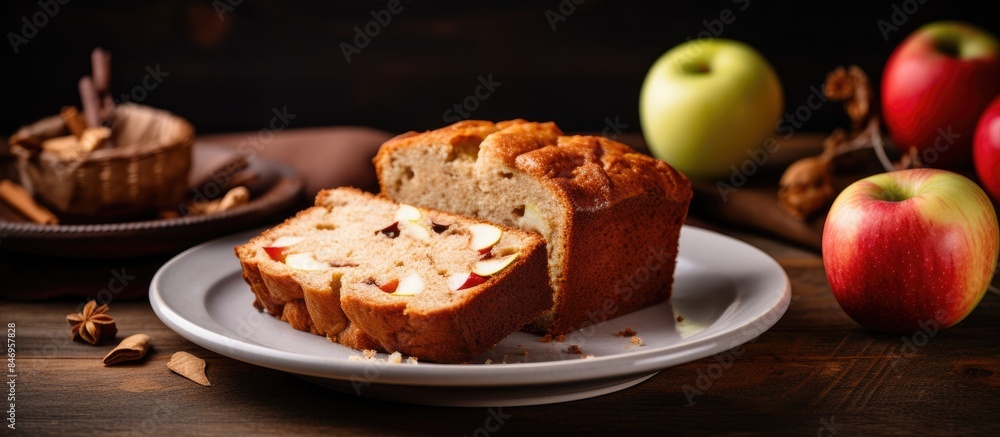 Poster Spicy apple loaf cake on a plate with sliced apples. with copy space image. Place for adding text or design