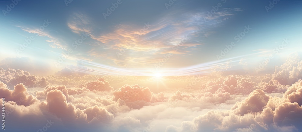 Poster Sky displaying the bright sun peeking through fluffy clouds, creating a beautiful sunrise scene with radiant rays of light. with copy space image. Place for adding text or design