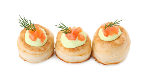 Delicious puff pastry with avocado cream, salmon and dill isolated on white
