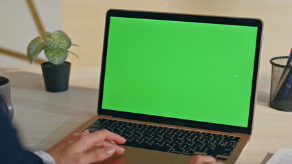 Freelancer hands swiping chromakey laptop at office closeup. Woman working