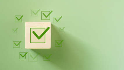 ISO 14001 quality control certification concept. wooden cubes with the abbreviation ISO with a...