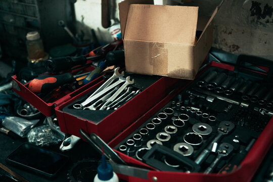 Tools, box and service for auto repair, spanner and instrument for maintenance in garage. Collection, equipment and wrench for fixing gear or toolkit at small business, socket and vehicle workshop