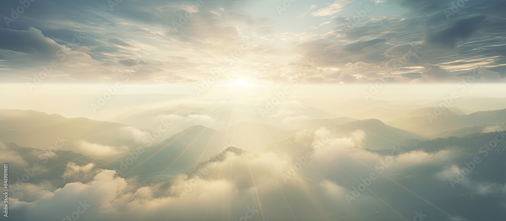 Aufkleber Mountain range under sunbeam, aerial view capturing misty sunshine rays. with copy space image. Place for adding text or design