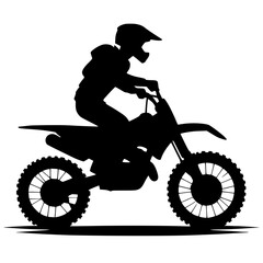 Silhouette of a person riding a motocross